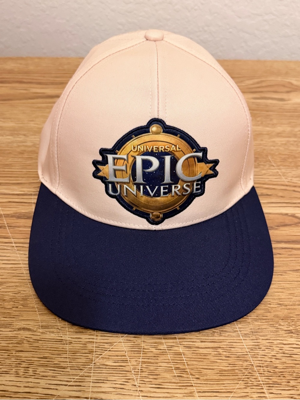 Universal Epic Universe Logo Baseball Cap Beige Navy